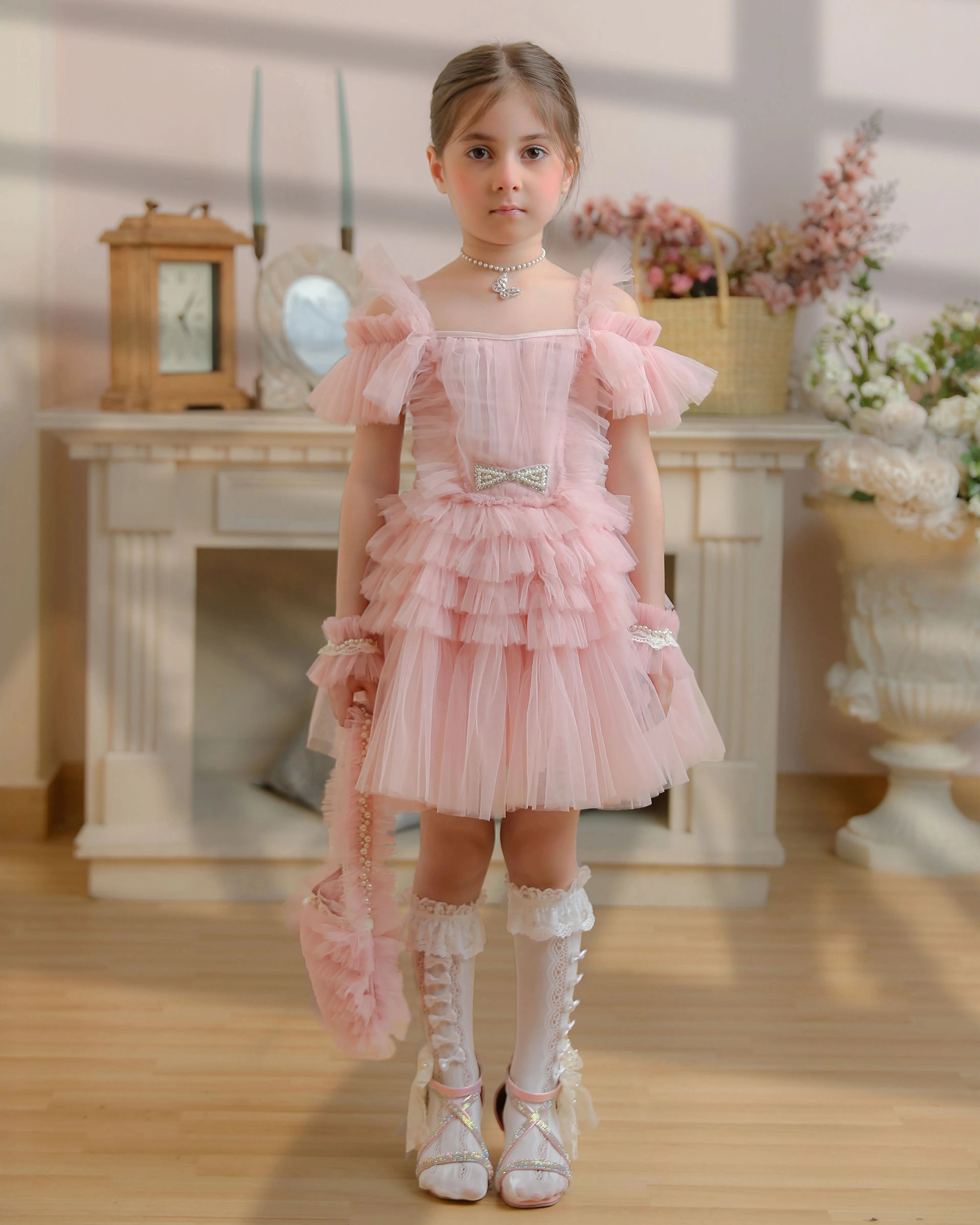 Girl wearing a pastel kids dress set with bow – perfect for daily wear, summer outings & birthdays | Shop girls dresses online – Lil Diva