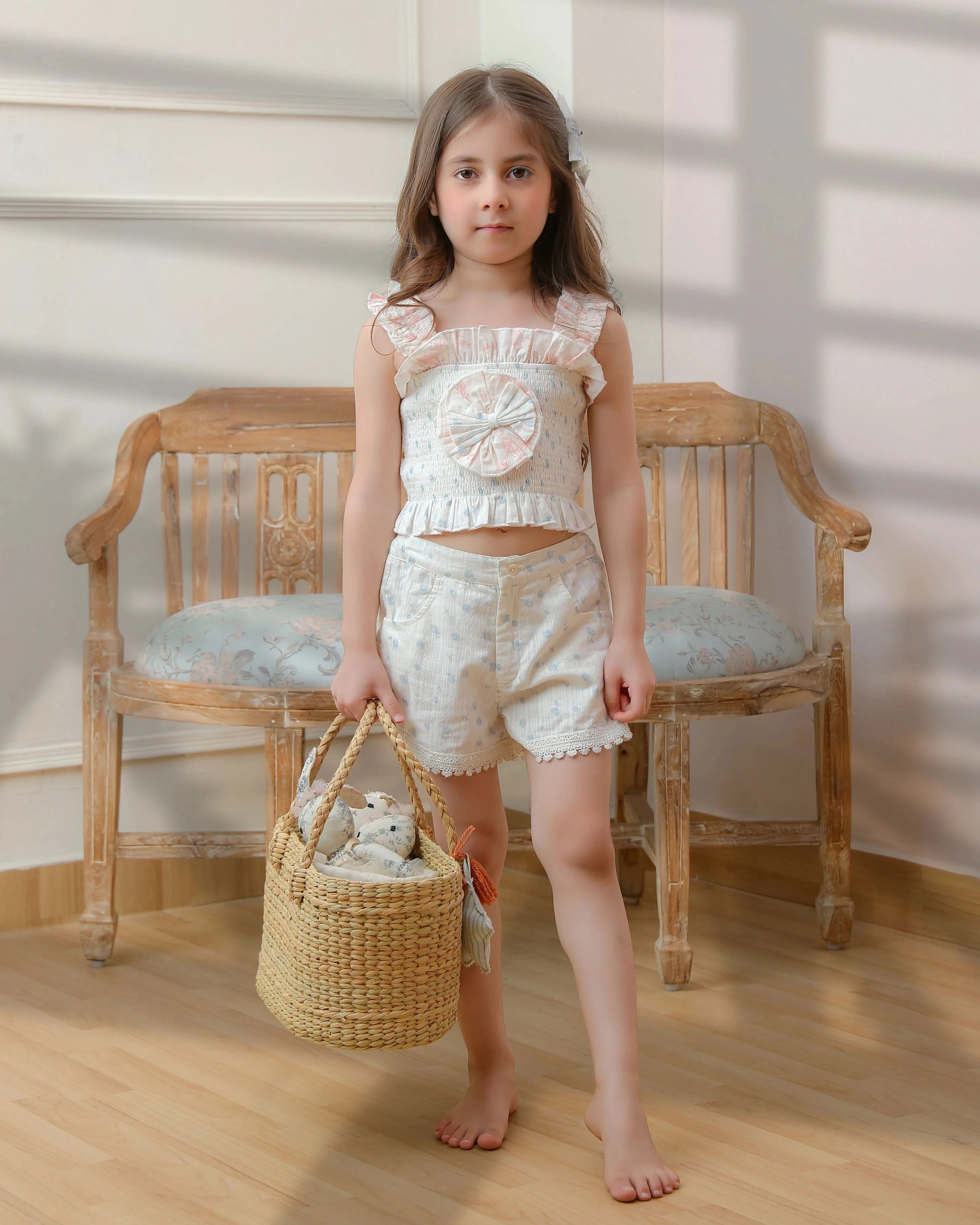 Young girl wearing pastel kids dress with bow – ideal for birthdays, weddings, or daily wear from Lil Diva Fashion